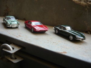 DeAgostini Supercars in 1:43. Left to Right: Aston Martin DB4, De Tomaso Pantera GTS and Jaguar E-Type
